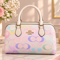 Coach Pastel Signature Bowling Bag – Multicolor Pink & Gold Luxury Handbag